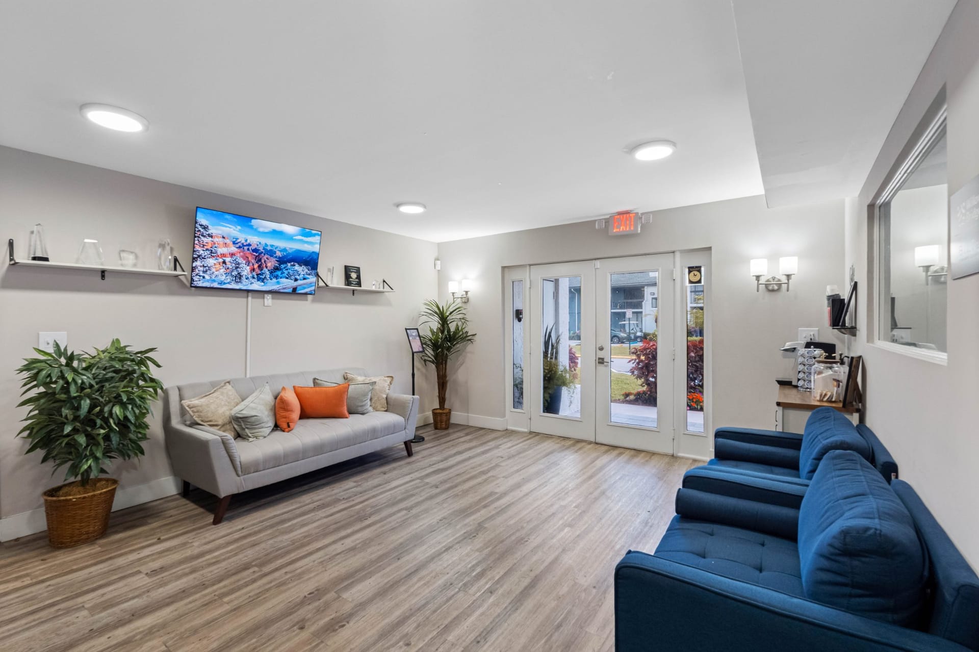 The Osprey Tamarac, FL — leasing center exterior aerial photography by Delray Drones