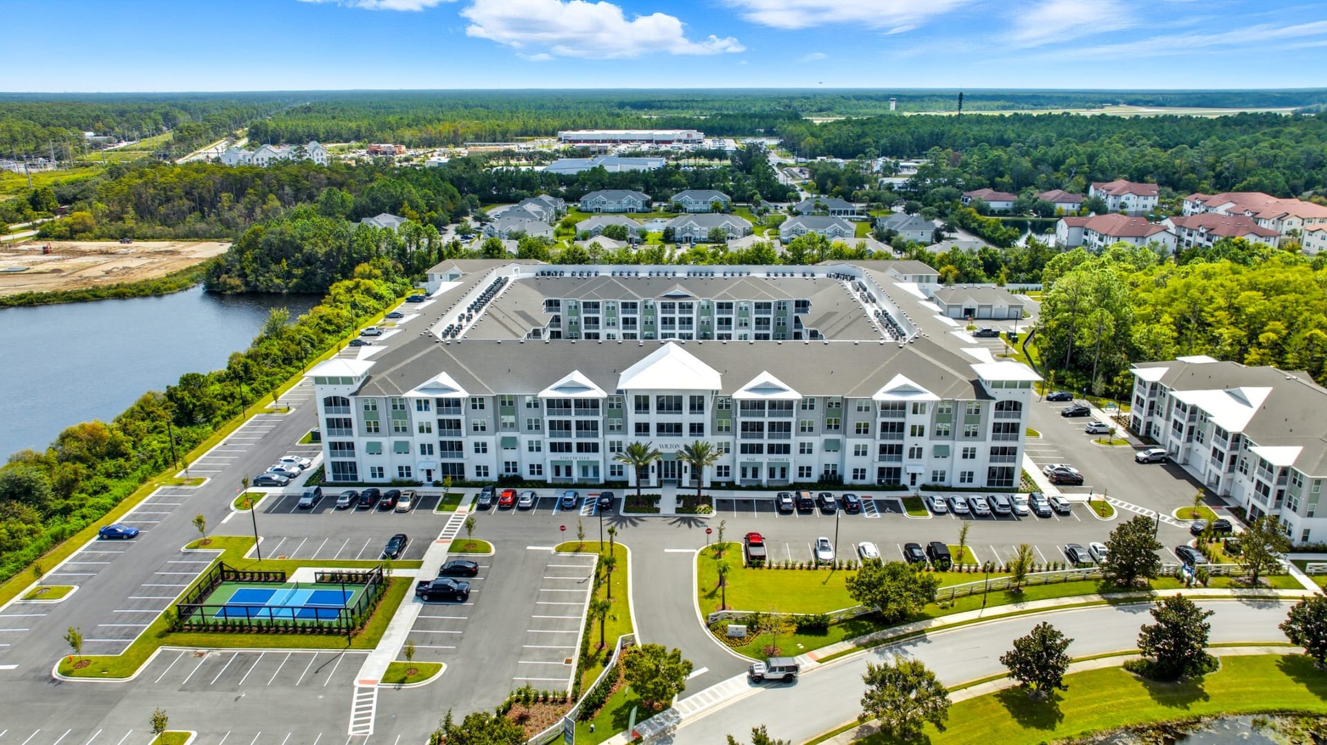 The Wilton Palm Coast, FL — building facade aerial photography by Delray Drones